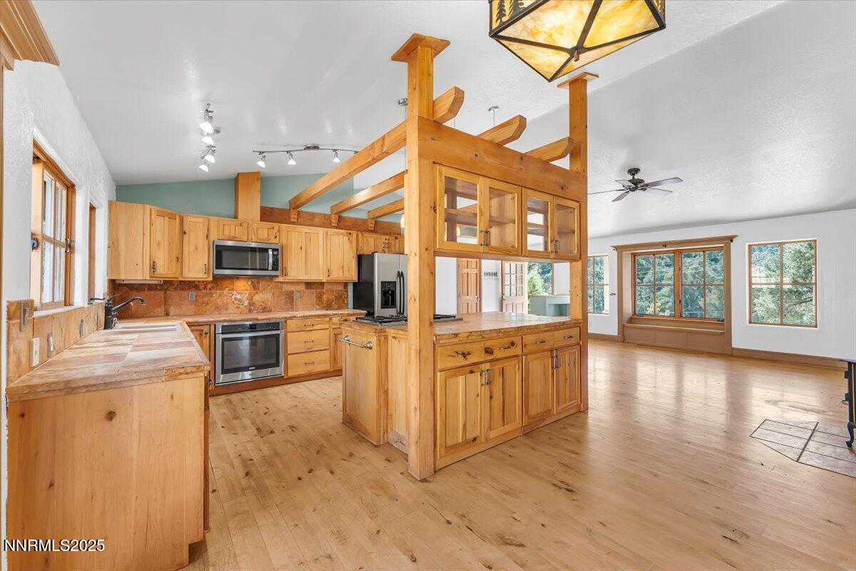 21410 Sazarac Road Reno, NV 89521 - Photo 7 of 41 a view of kitchen with furniture and wooden floor
