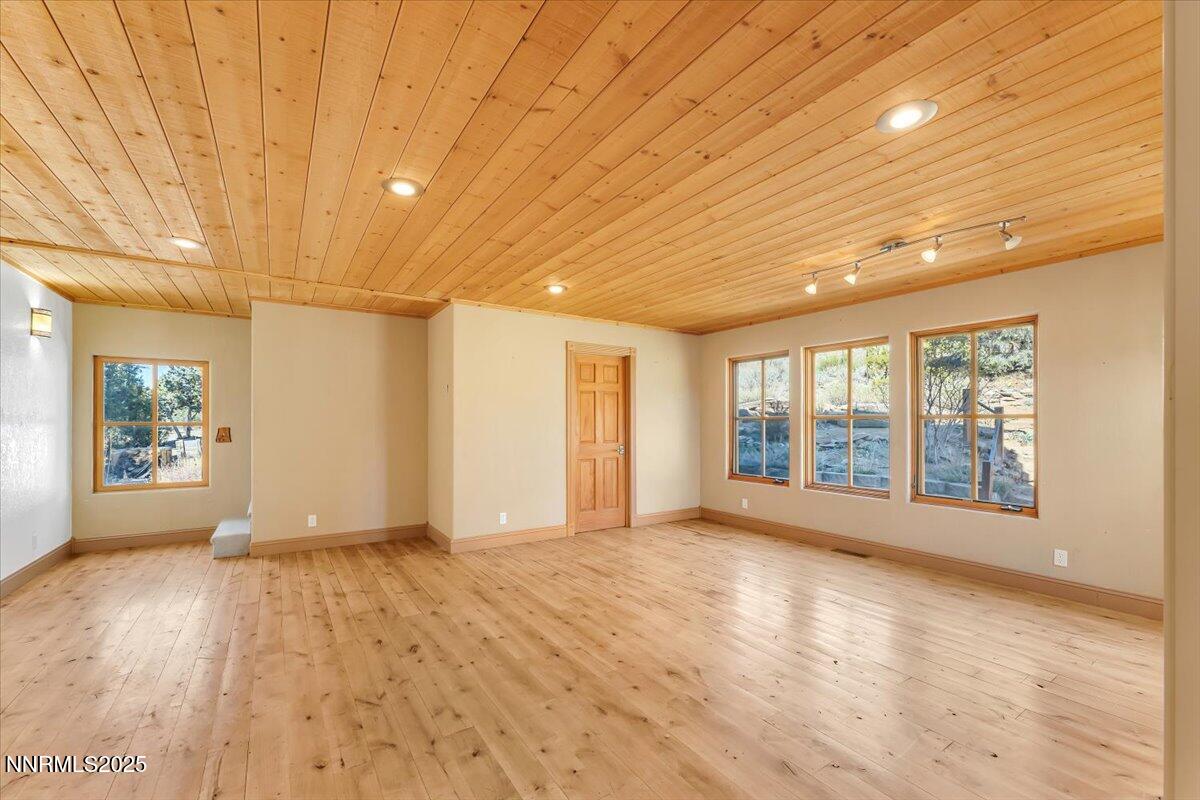 21410 Sazarac Road Reno, NV 89521 - Photo 10 of 41 a view of an empty room with a window
