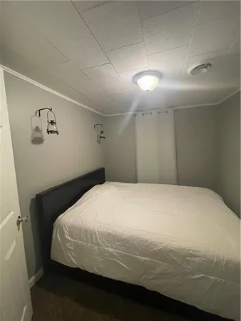 an empty room with wooden floor