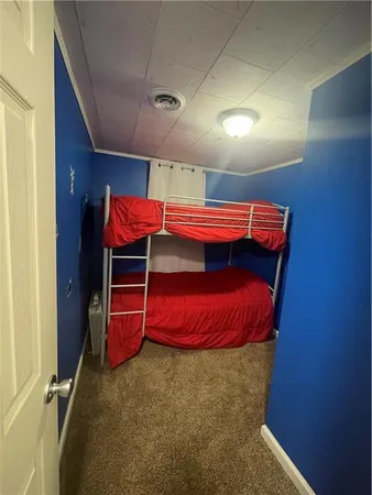 a bathroom with a sink toilet and mirror