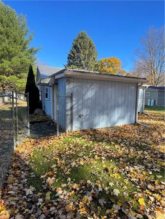 a house with trees in front of it