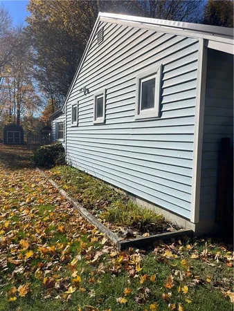 a backyard of a house with lots of green space