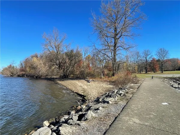 a view of a swimming pool and outdoor space