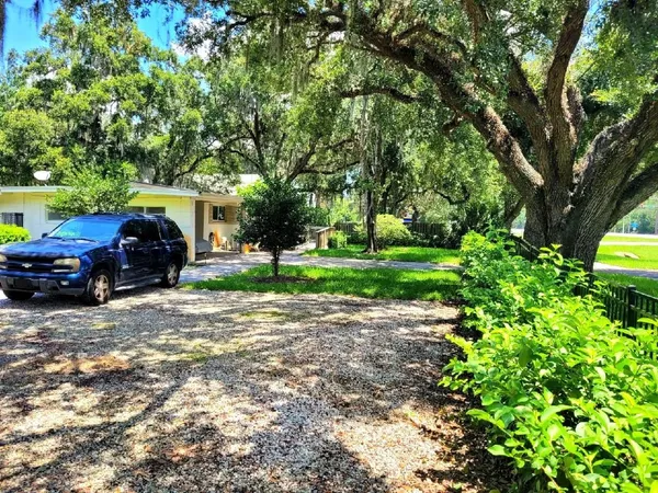 a view of a house with a big yard