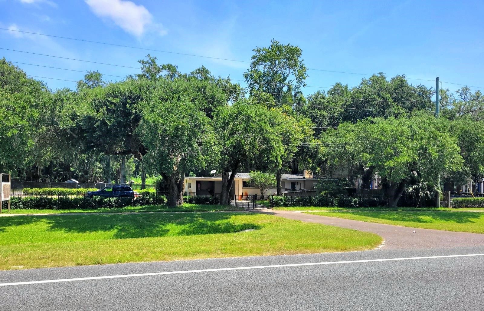 930 Highway 16 St. Augustine, FL 32084 - Photo 14 of 27 a view of a house with a big yard