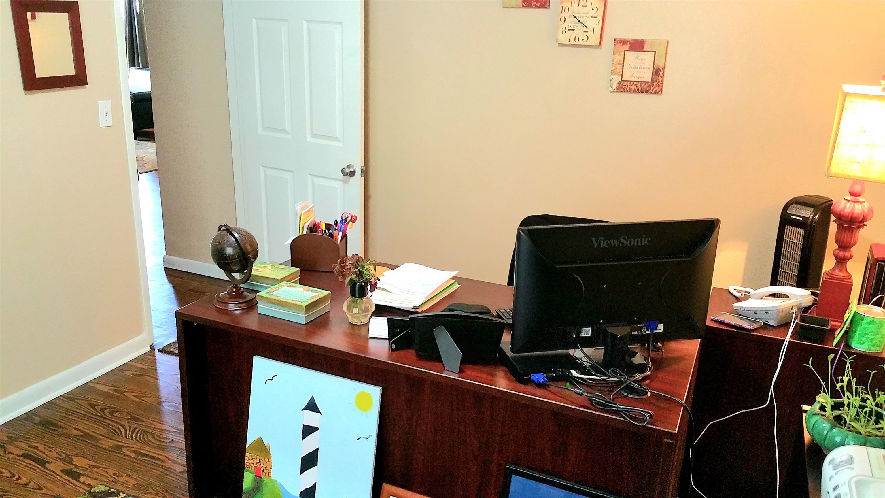 930 Highway 16 St. Augustine, FL 32084 - Photo 24 of 27 a living room with furniture and wooden floor