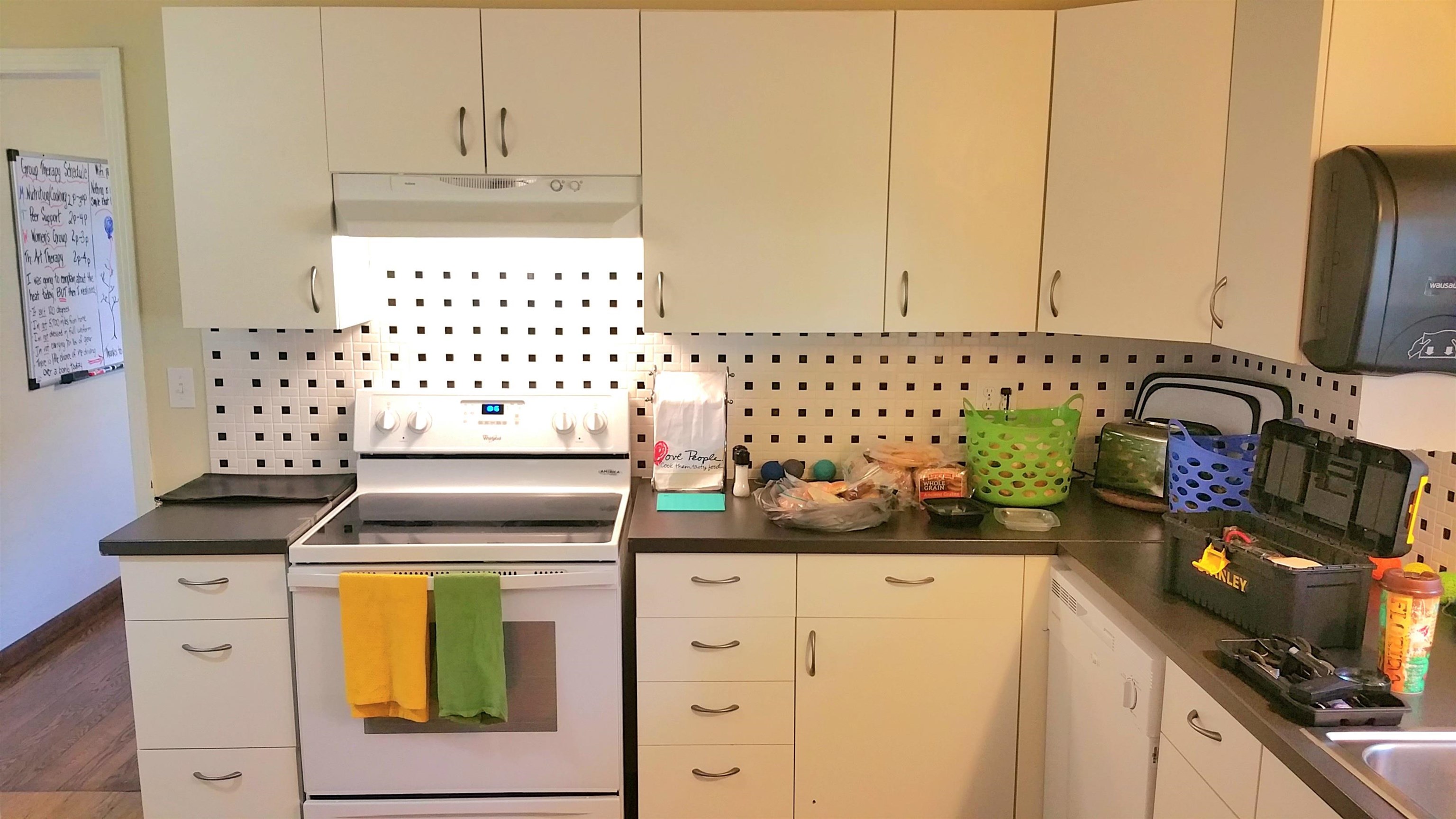 930 Highway 16 St. Augustine, FL 32084 - Photo 26 of 27 a kitchen with stainless steel appliances a stove and a refrigerator