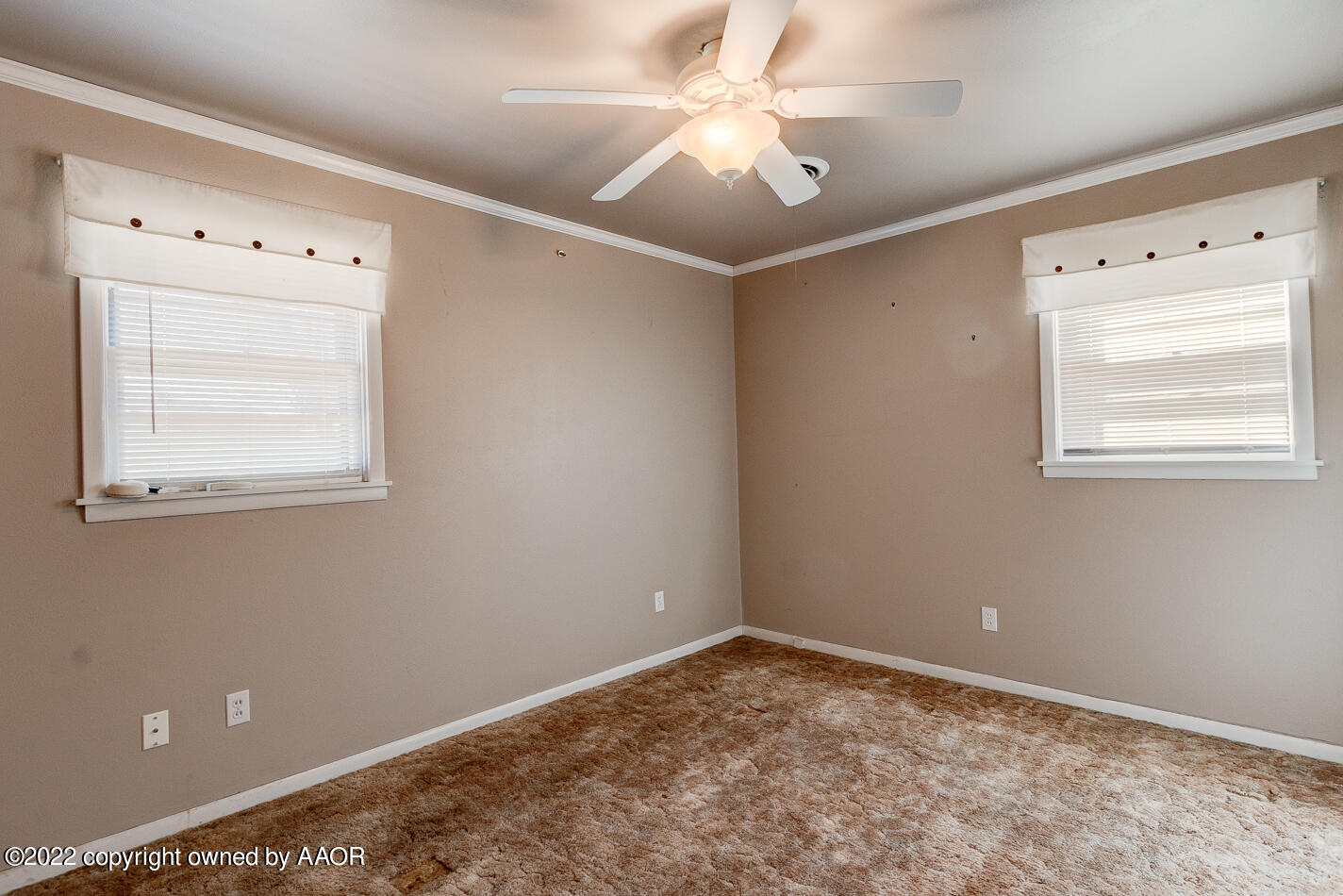 5015 South Milam Street Amarillo, TX 79110 - Photo 8 of 15 a view of an empty room with a window