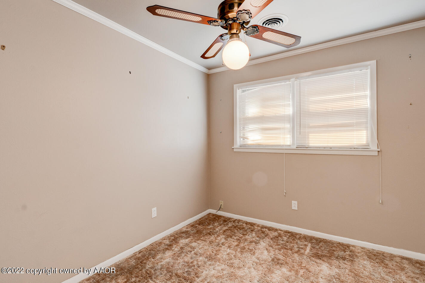 5015 South Milam Street Amarillo, TX 79110 - Photo 9 of 15 a view of an empty room with a window