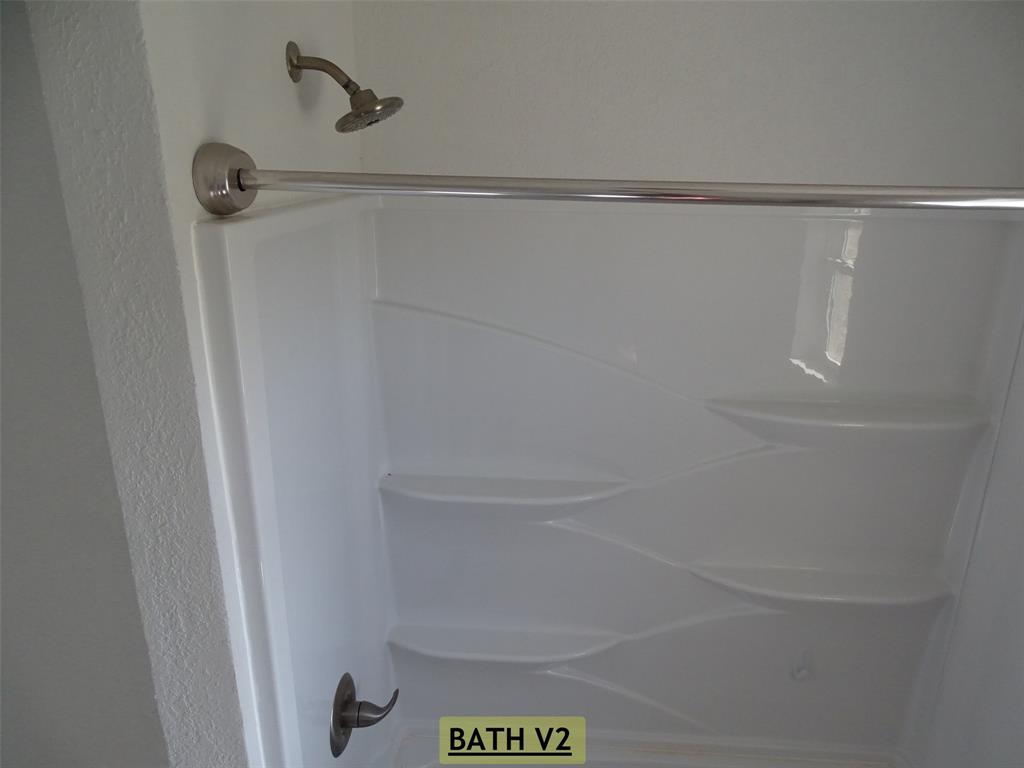 908 Brookside Street Sweetwater, TX 79556 - Photo 11 of 20 a shower view in the bathroom