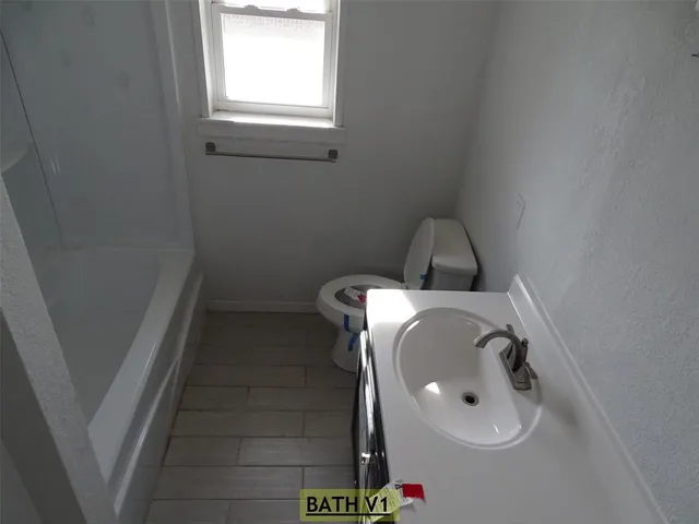 a bathroom with a window