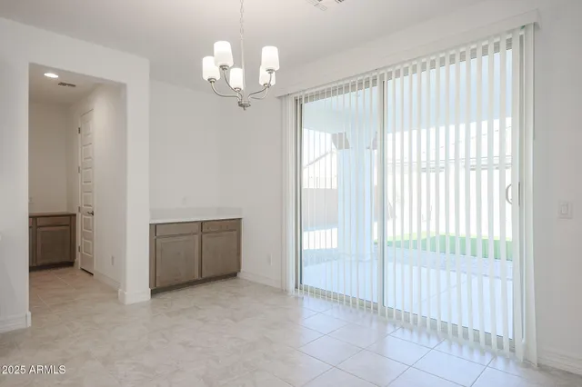 wooden floor and window in an empty room