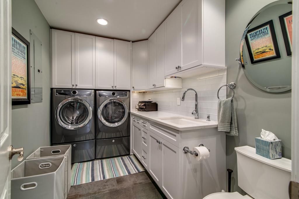 1102 Center Point Road Hendersonville, TN 37075 - Photo 14 of 30 a utility room with sink dryer and washer