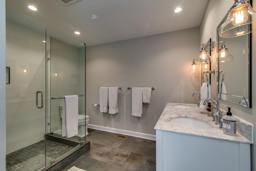 1102 Center Point Road Hendersonville, TN 37075 - Photo 17 of 30 a bathroom with a sink and a mirror
