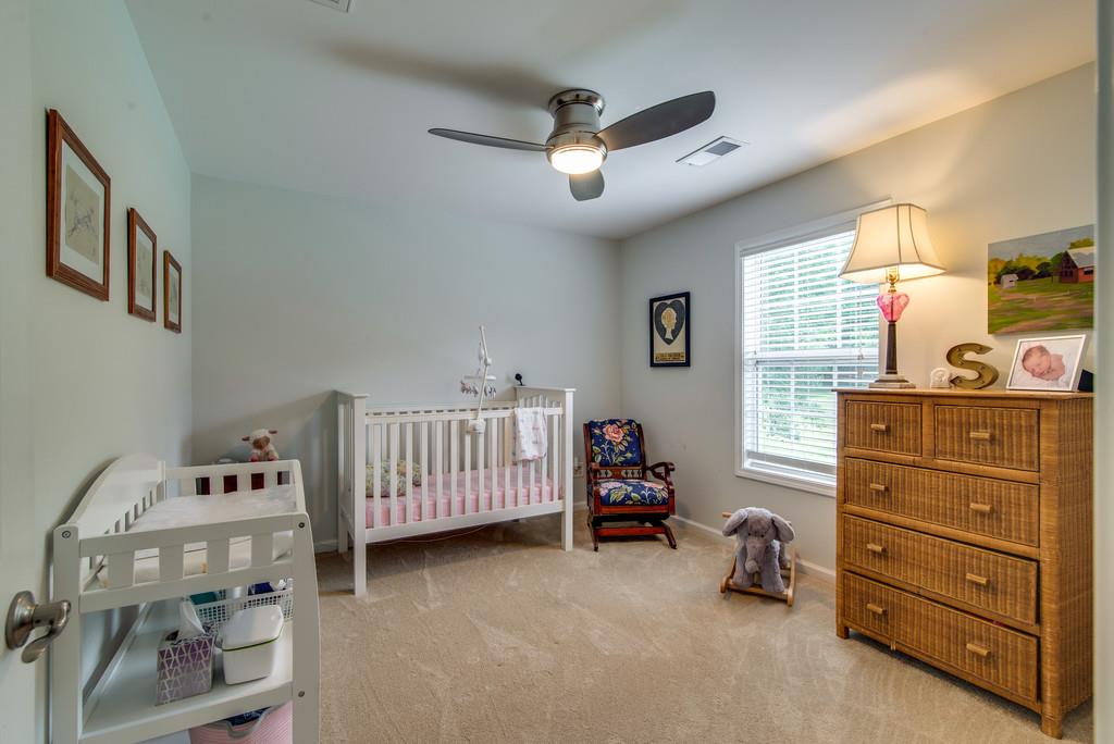 1102 Center Point Road Hendersonville, TN 37075 - Photo 21 of 30 a bedroom with a bed and a dresser