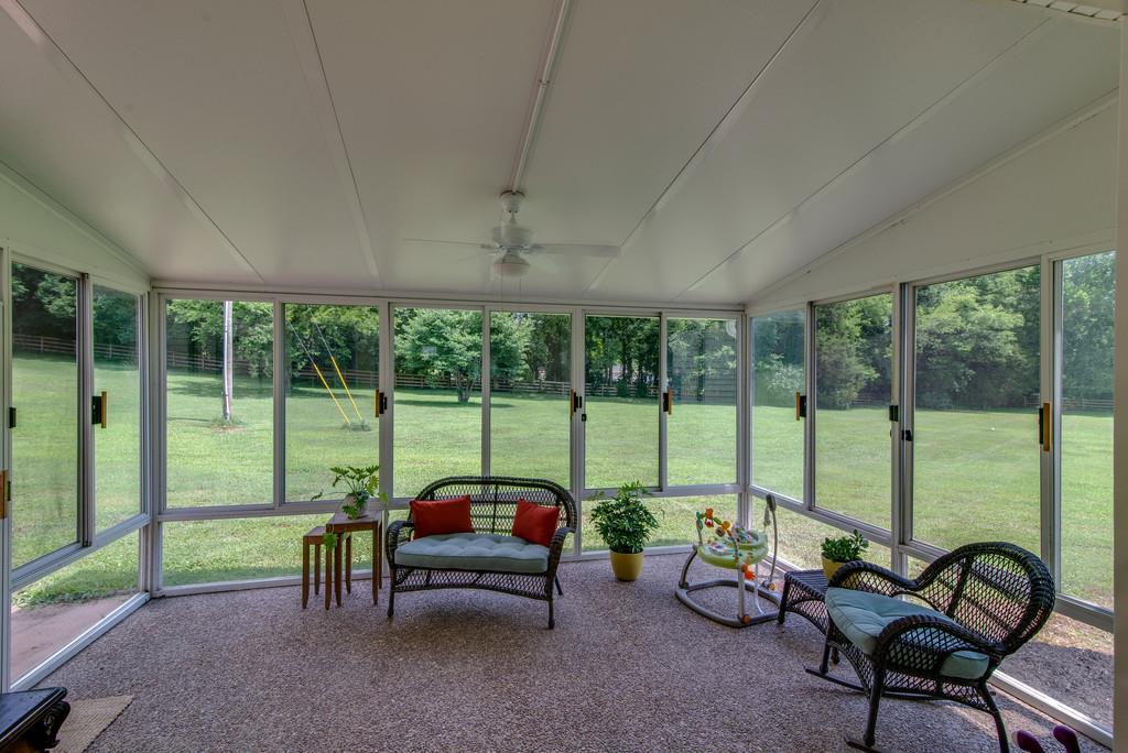 1102 Center Point Road Hendersonville, TN 37075 - Photo 24 of 30 a living room with furniture and floor to ceiling window