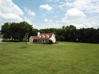 1102 Center Point Road Hendersonville, TN 37075 - Photo 28 of 30 a backyard of a house with lots of green space and lake view