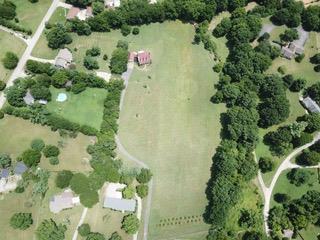 1102 Center Point Road Hendersonville, TN 37075 - Photo 3 of 30 an aerial view of a house with a yard and large trees