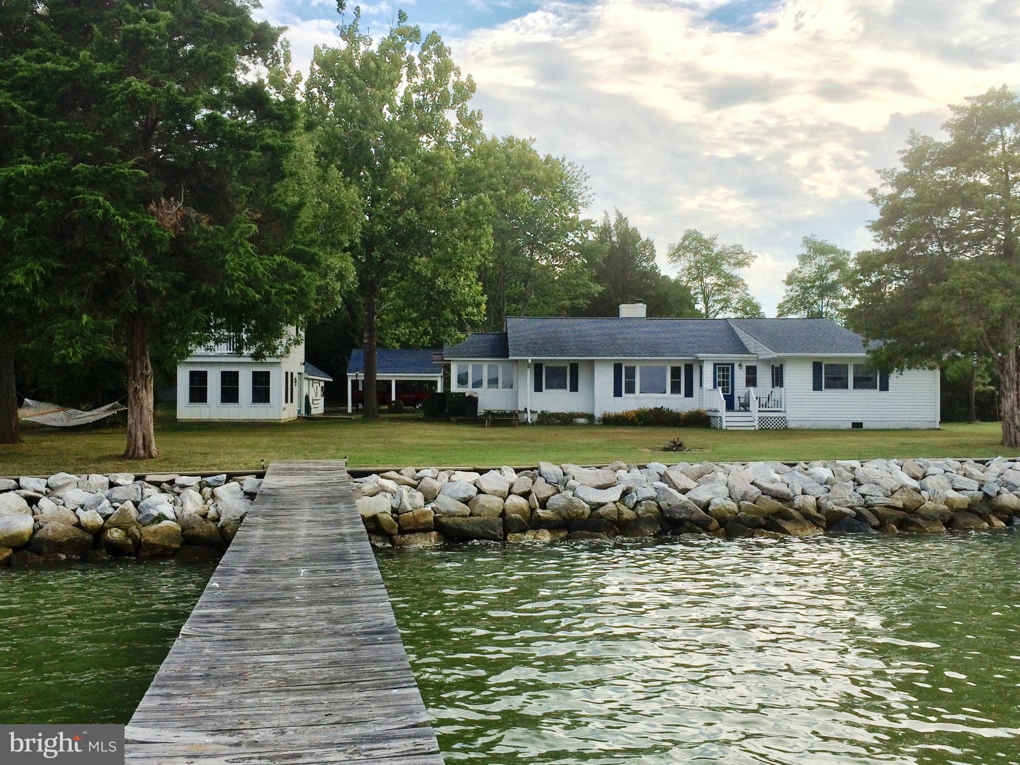 a view of a house with a swimming pool