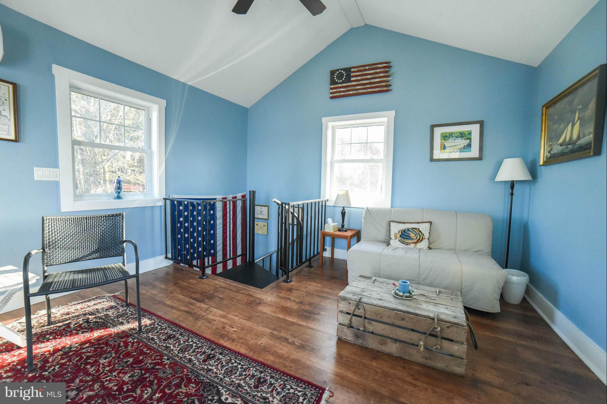 16466 Piney Point Road Piney Point, MD 20674 - Photo 20 of 27 a bedroom with a bed dresser and a window