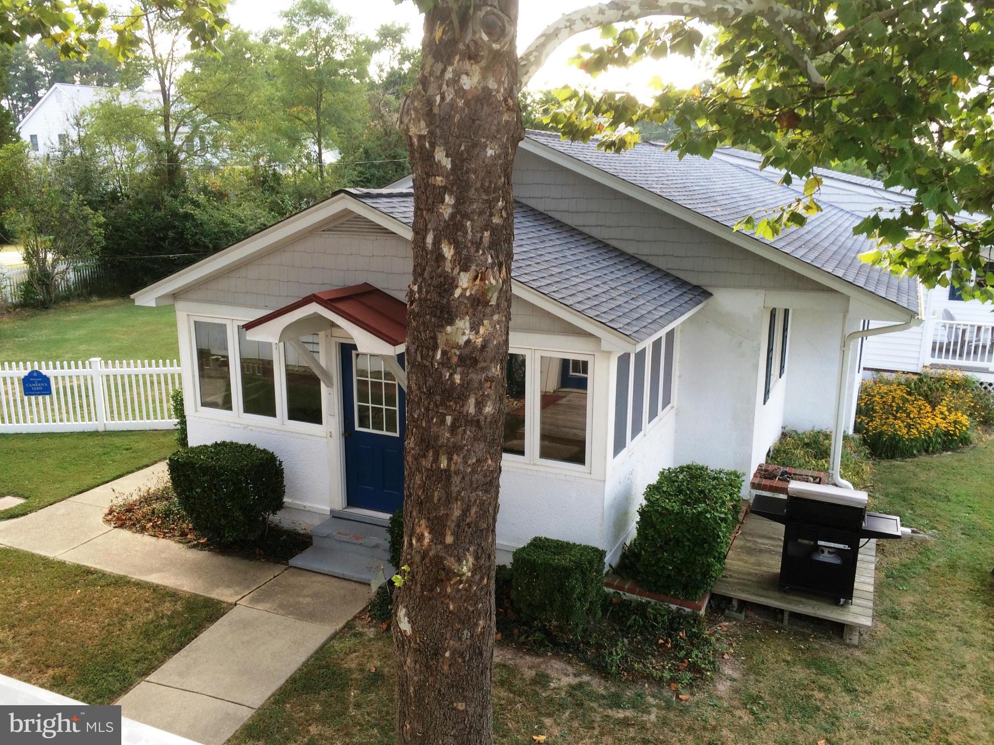 16466 Piney Point Road Piney Point, MD 20674 - Photo 23 of 27 a front view of a house with garden