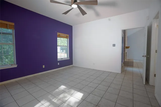 a view of an empty room and window