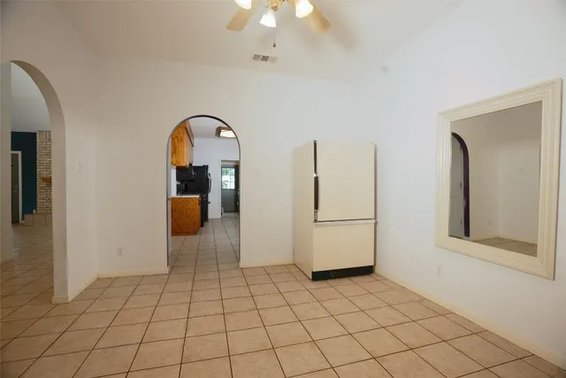 a view of empty room with windows