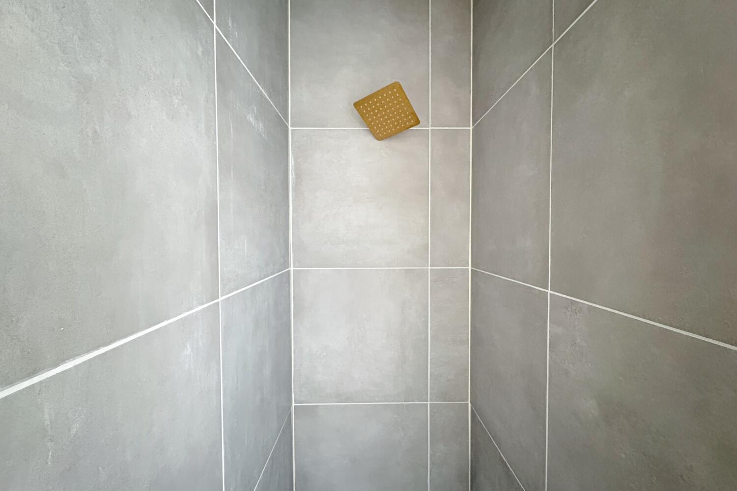 809 West 5th Street Wolfforth, TX 79382 - Photo 13 of 23 a bathroom with a shower