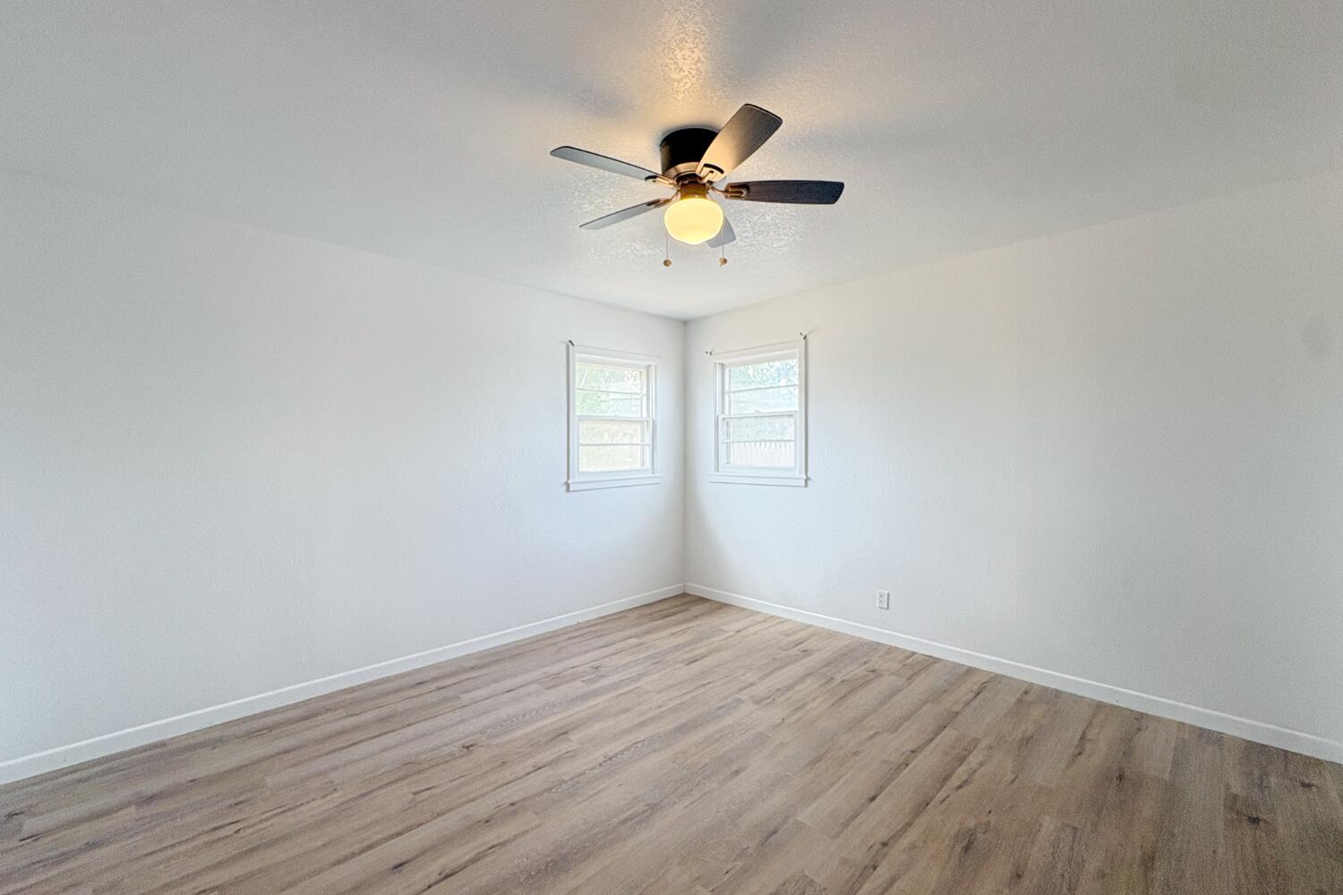 809 West 5th Street Wolfforth, TX 79382 - Photo 18 of 23 a view of empty room with wooden floor