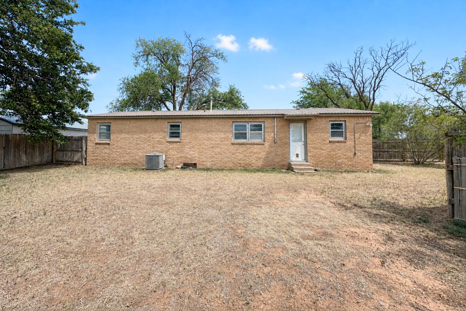 809 West 5th Street Wolfforth, TX 79382 - Photo 20 of 23 front view of house with a yard