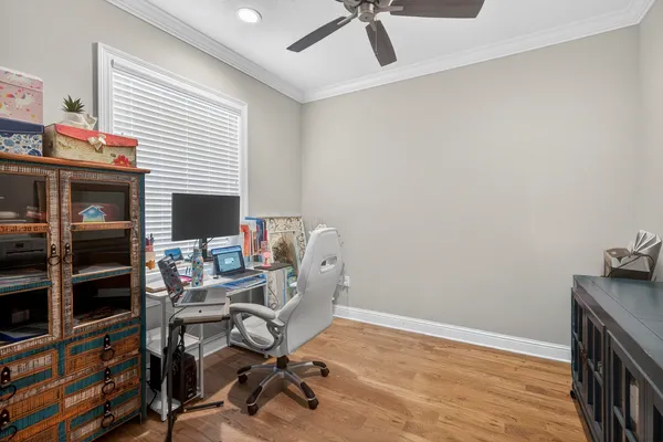 a view of a workspace with furniture