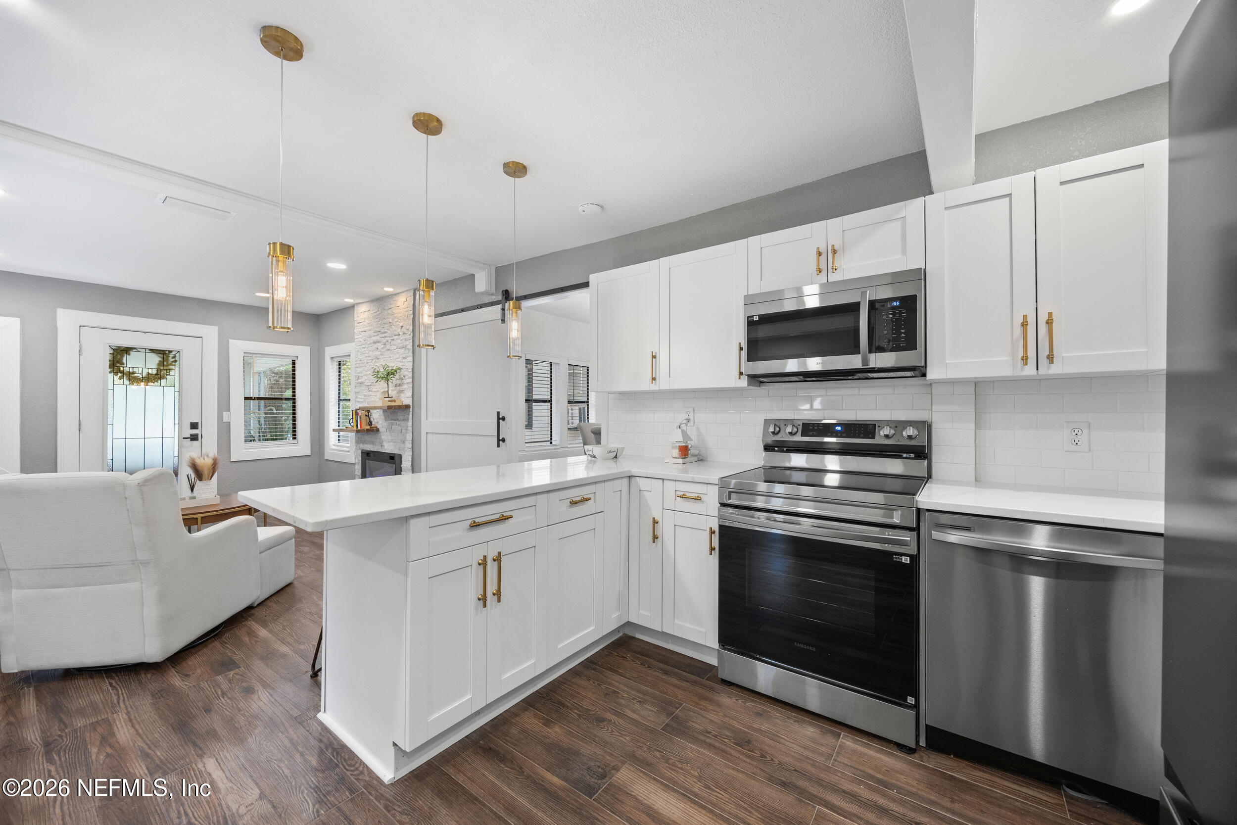 136 Washington Street St. Augustine, FL 32084 - Photo 14 of 37 Elegant Gold Accents & Tile Backsplash