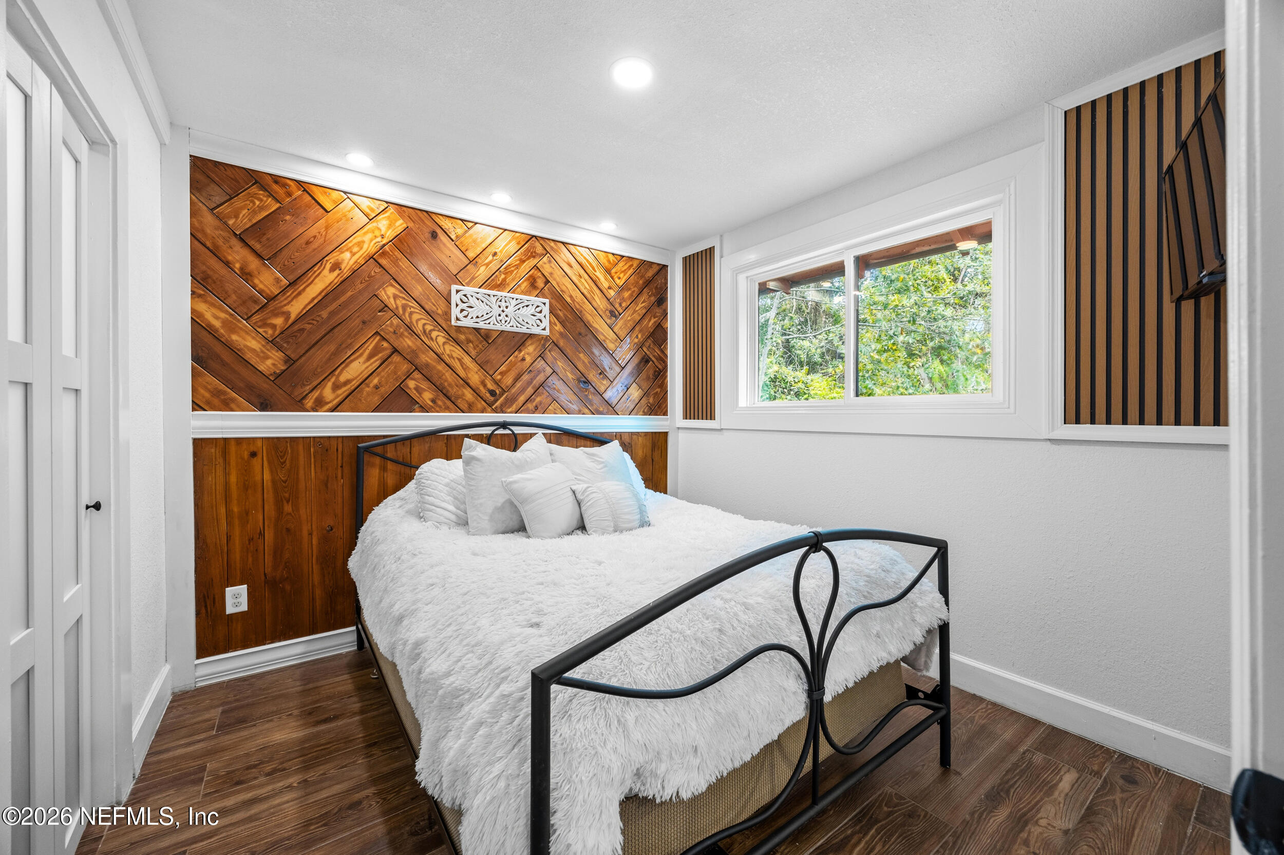 136 Washington Street St. Augustine, FL 32084 - Photo 3 of 37 Relaxing Primary Bedroom w Accent Wall