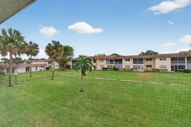 a view of a house with a big yard