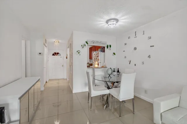 a view of a livingroom with furniture and wooden floor