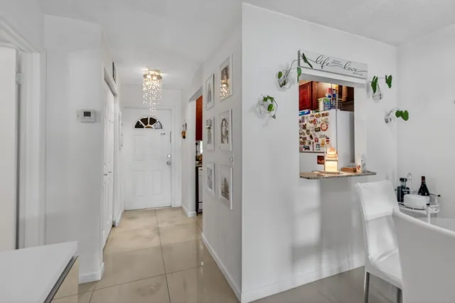 a bathroom with a shower and a sink