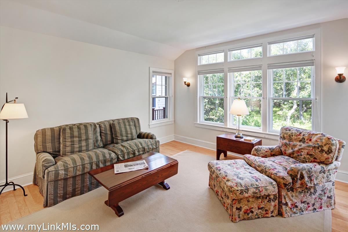 78 Hammett Road Chilmark, MA 02535 - Photo 35 of 53 a living room with furniture and a large window