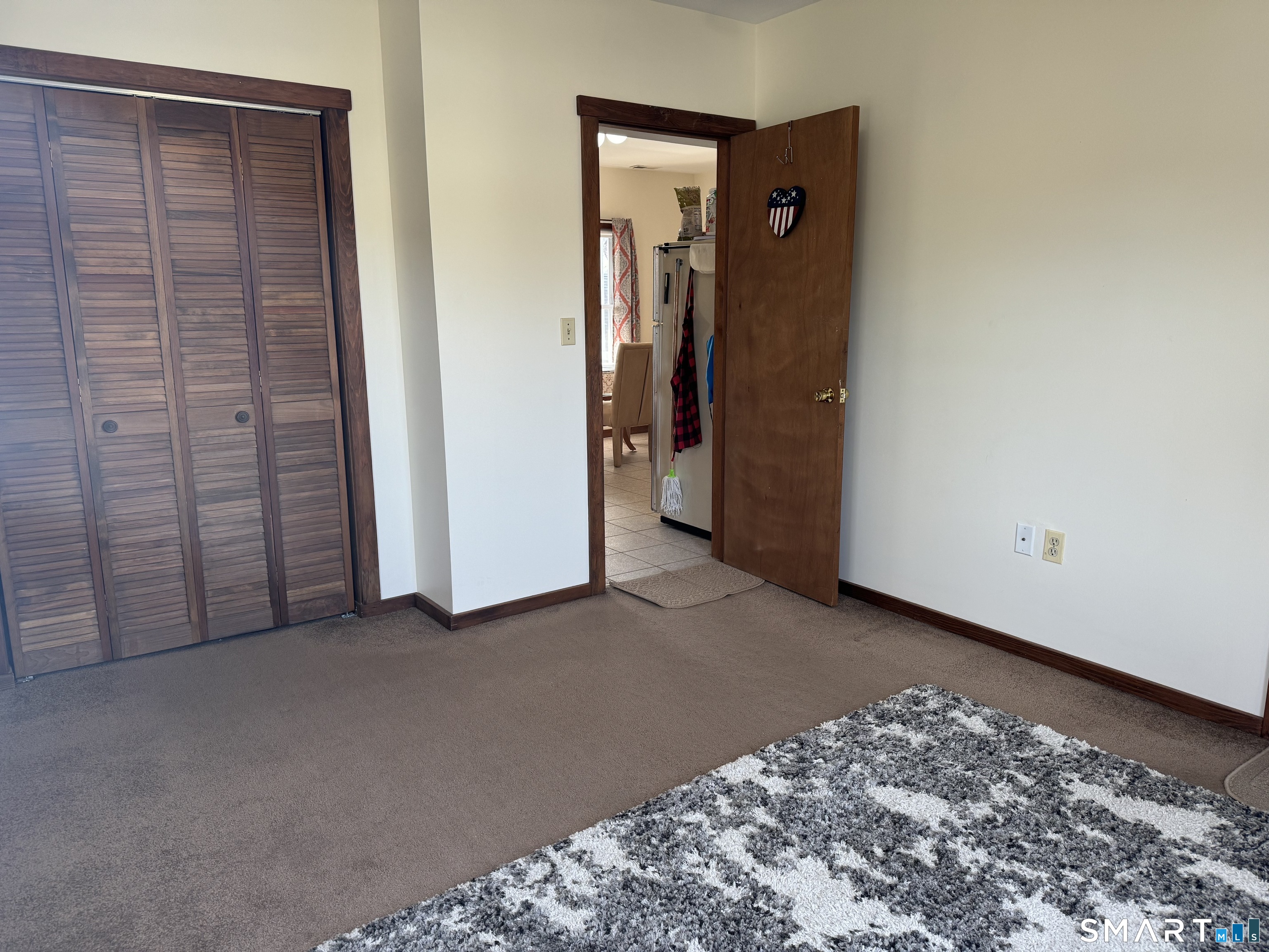 156 Fair Street, Unit 2 Wallingford, CT 06492 - Photo 12 of 15 a view of a hallway with closet