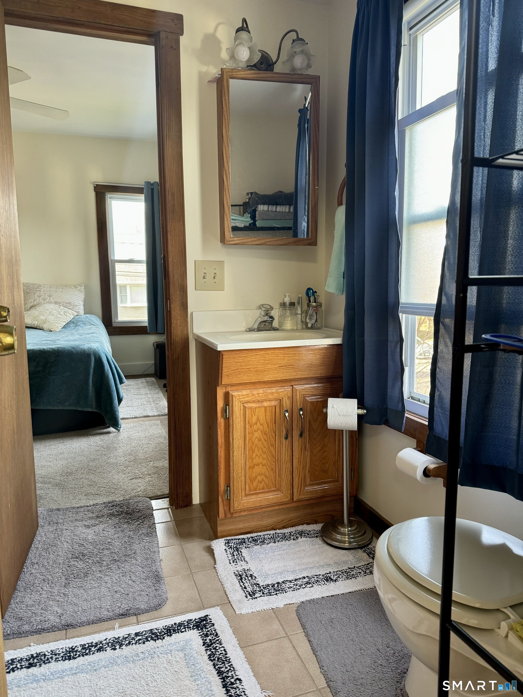 156 Fair Street, Unit 2 Wallingford, CT 06492 - Photo 13 of 15 a living room with a couch and a table