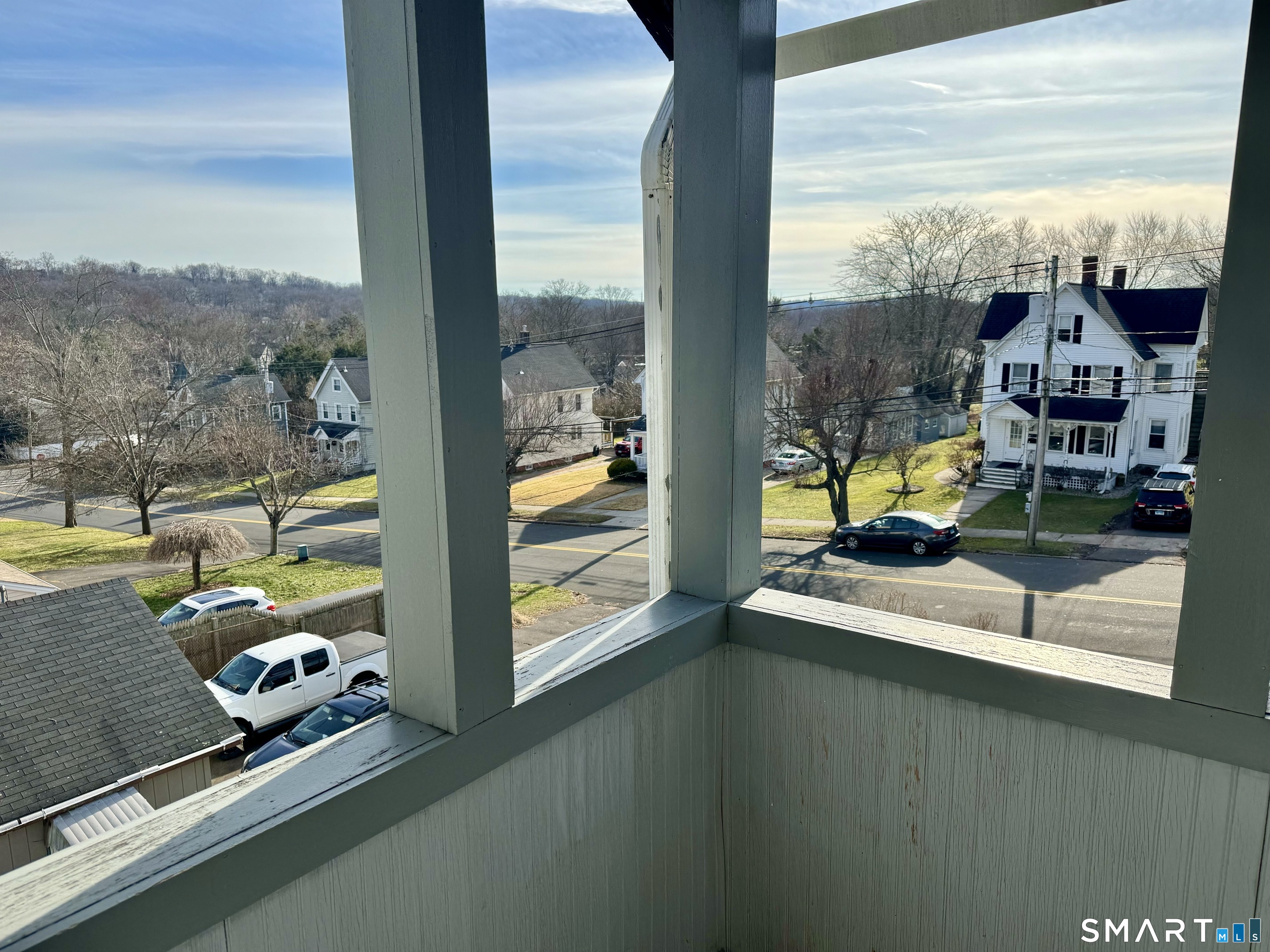 156 Fair Street, Unit 2 Wallingford, CT 06492 - Photo 15 of 15 a room with furniture and a floor to ceiling window