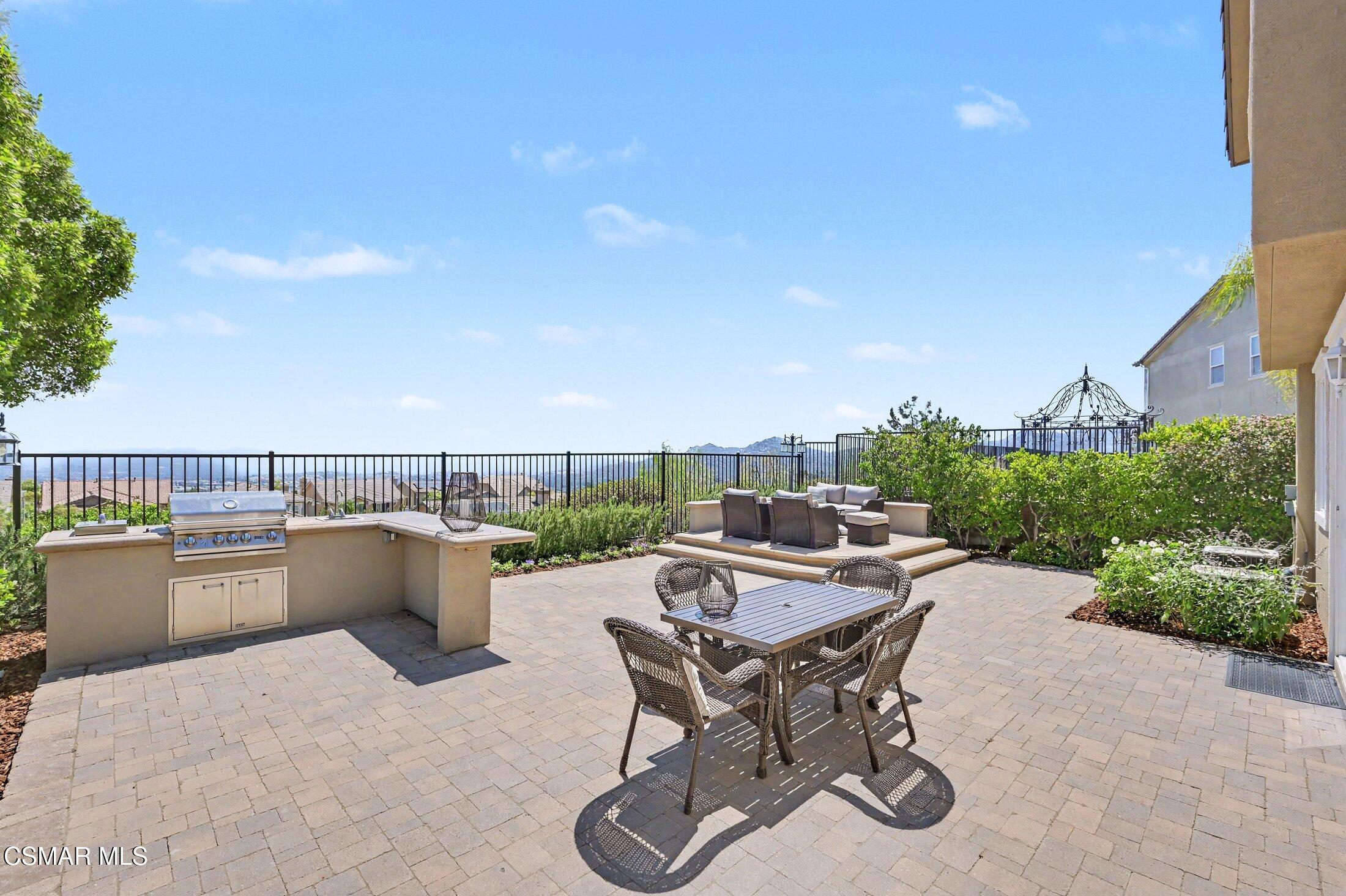 20800 Sardinia Way Porter Ranch, CA 91326 - Photo 51 of 57 a view of a terrace with furniture