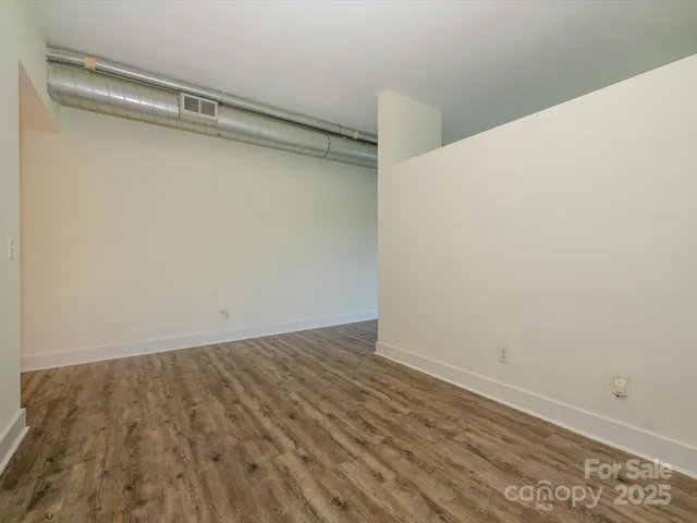 a view of a room with an empty space