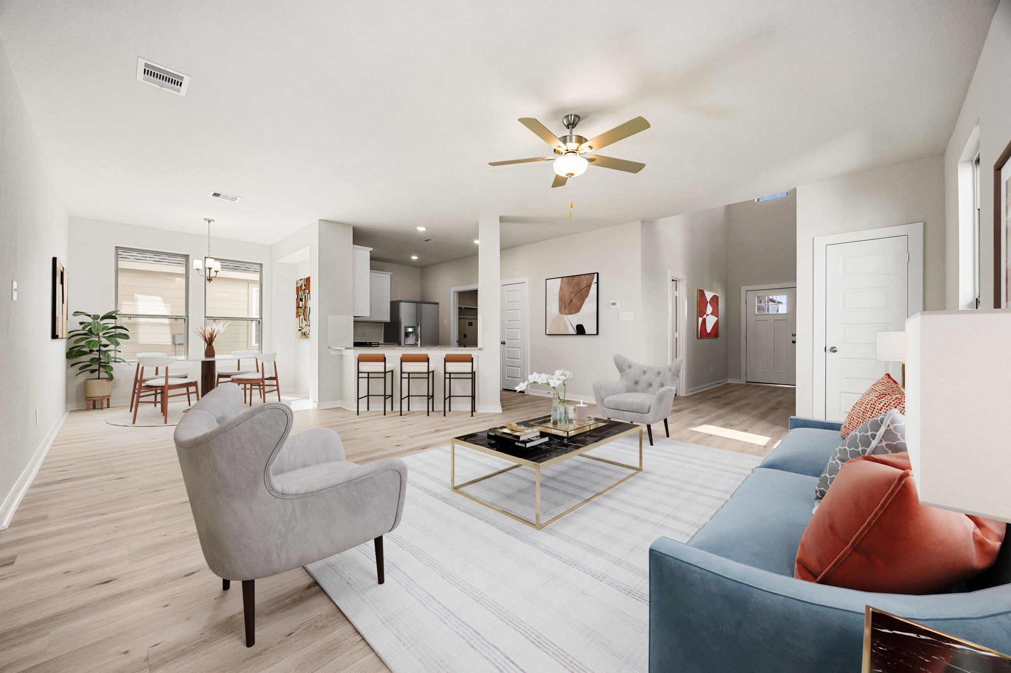 1128 Lilly Lane Bellville, TX 77418 - Photo 24 of 25 Embrace the seamless flow of modern living in this beautifully integrated open-concept floor plan. Light wide-plank flooring unifies the spacious living area, gourmet kitchen, and adjacent dining nook, creating an airy and cohesive environment perfect for entertaining and daily life. *Virtually Staged