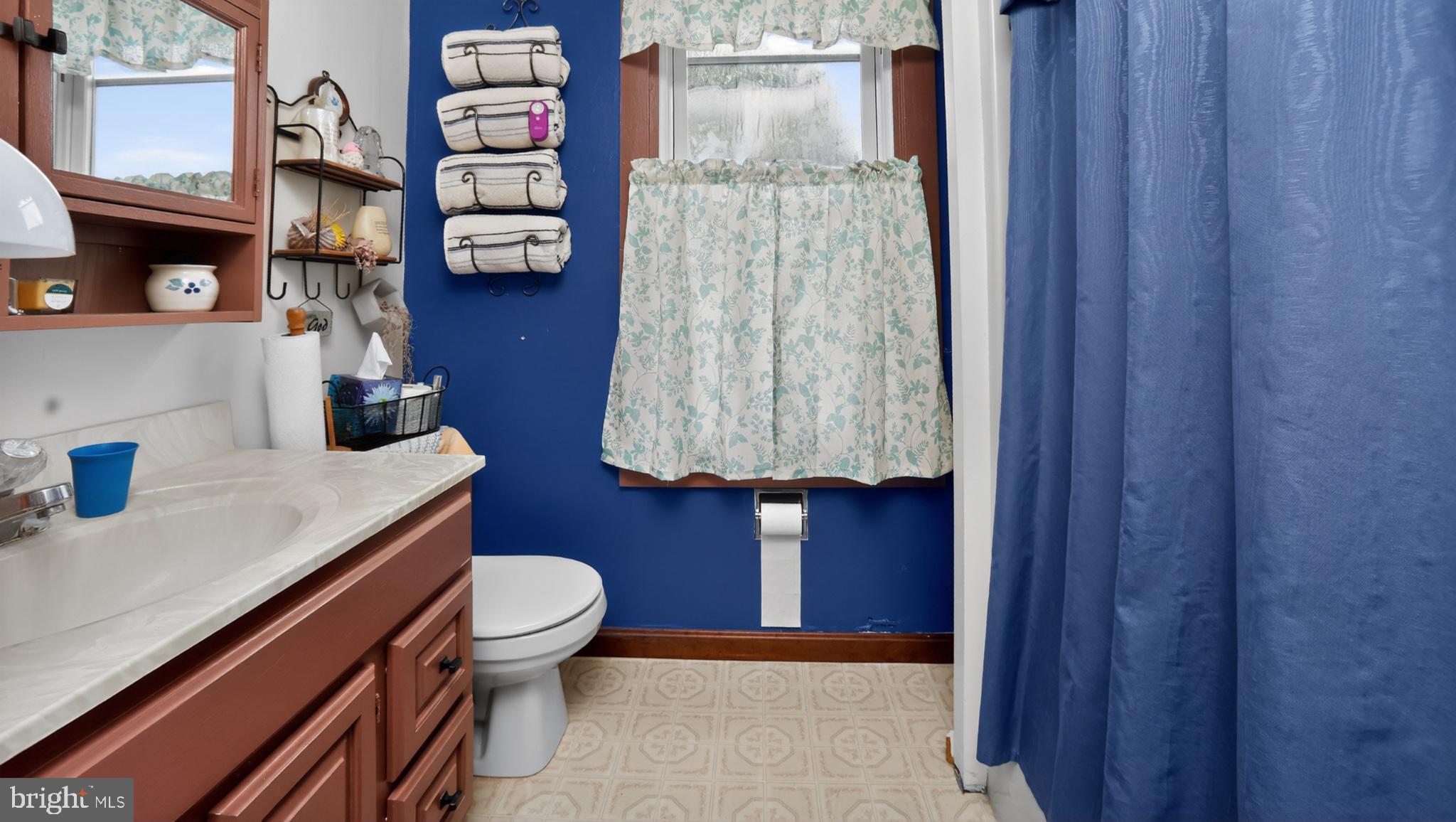 40 Queen Road Intercourse, PA 17529 - Photo 51 of 58 a bathroom with a toilet sink and shower