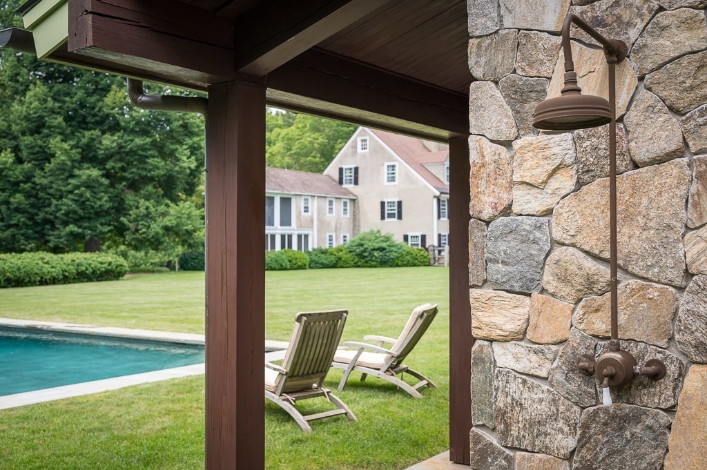 1028 Bay Road Hamilton, MA 01982 - Photo 8 of 42 a view of a patio with chair and table
