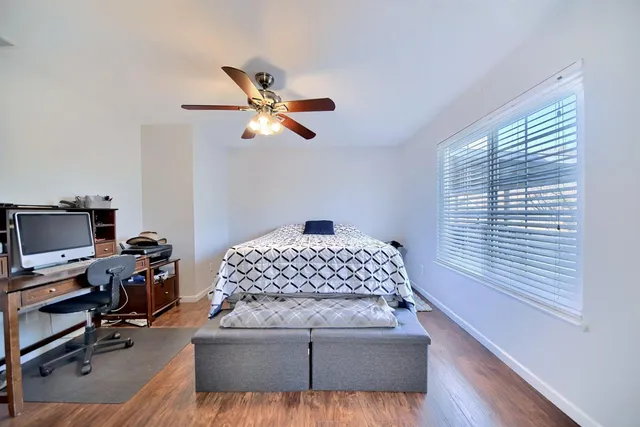 a bathroom with a sink toilet and mirror