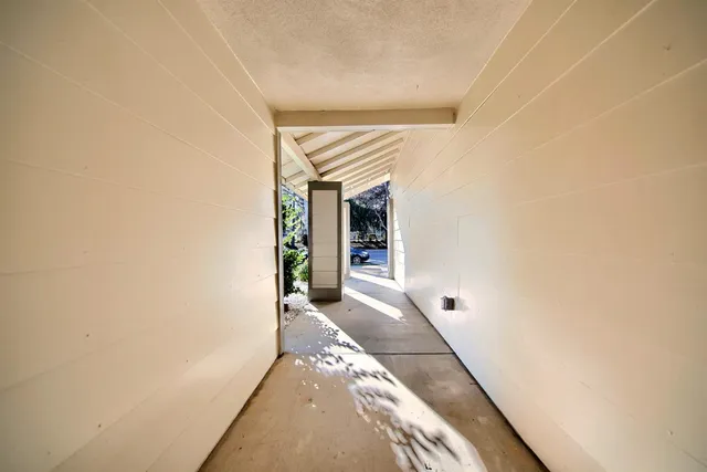 a view of a back yard of the house