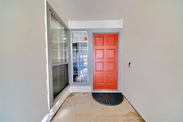 an empty room with windows