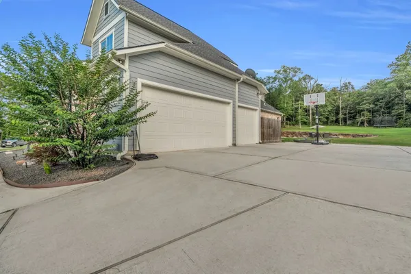$1,195,000 | 14702 Topaz Court, Willis, TX 77378