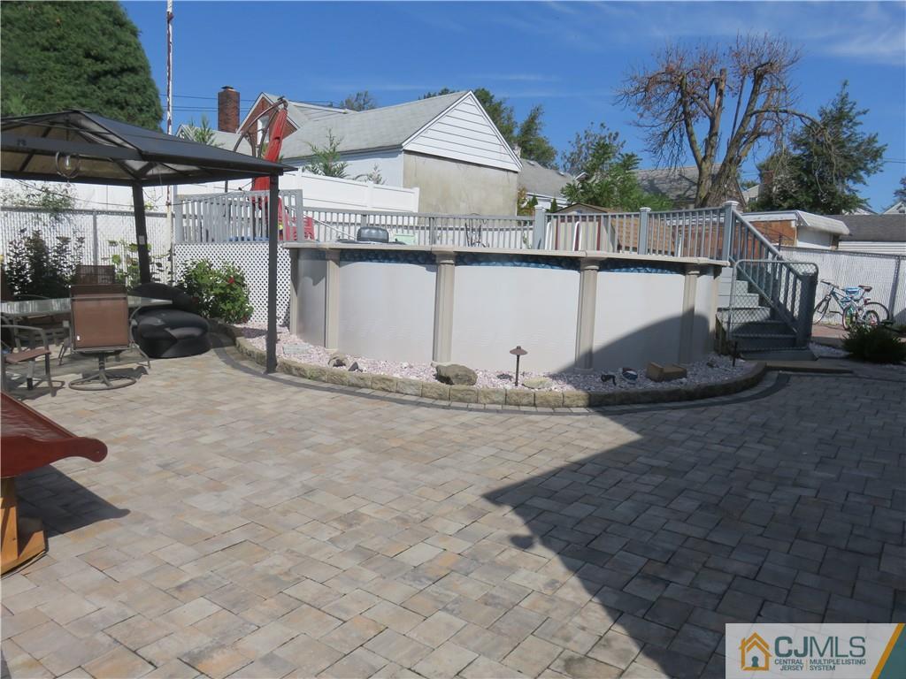 551 Colgate Avenue Perth Amboy, NJ 08861 - Photo 14 of 16 a view of a house with a outdoor space